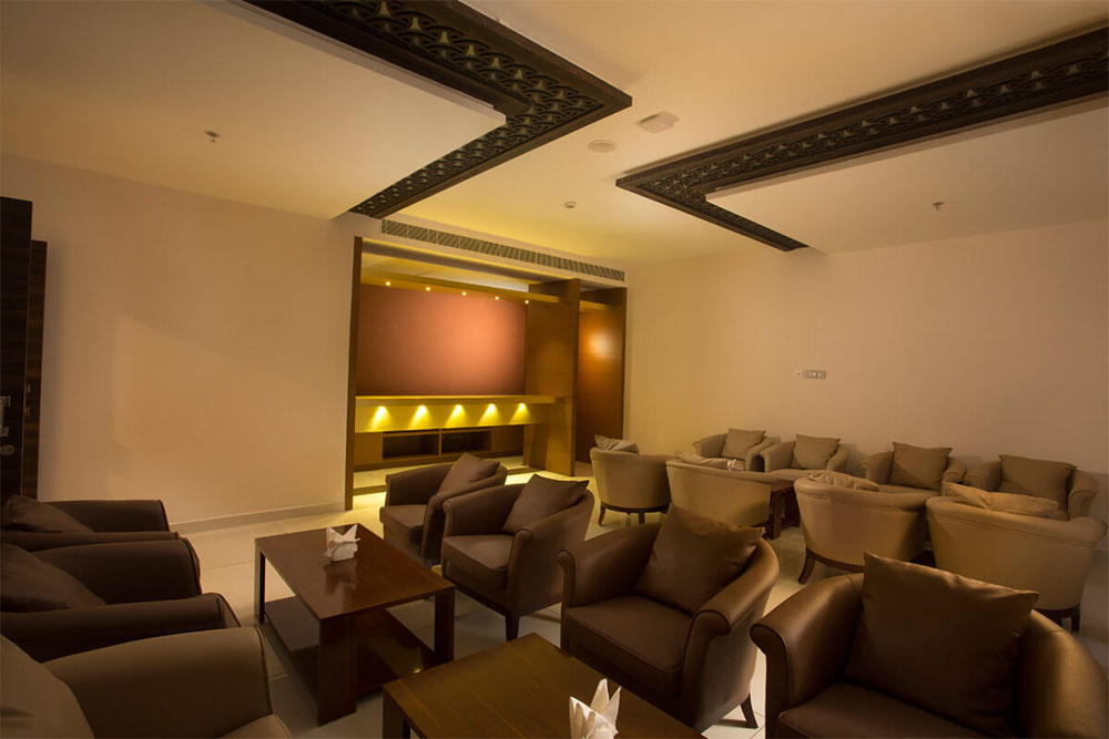 Stylish bar area at Blue Serene resort offering a variety of drinks